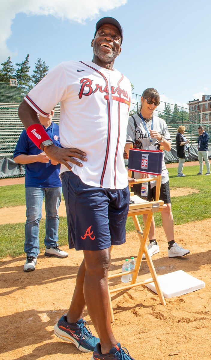 Fred McGriff smiles wearing Braves jersey