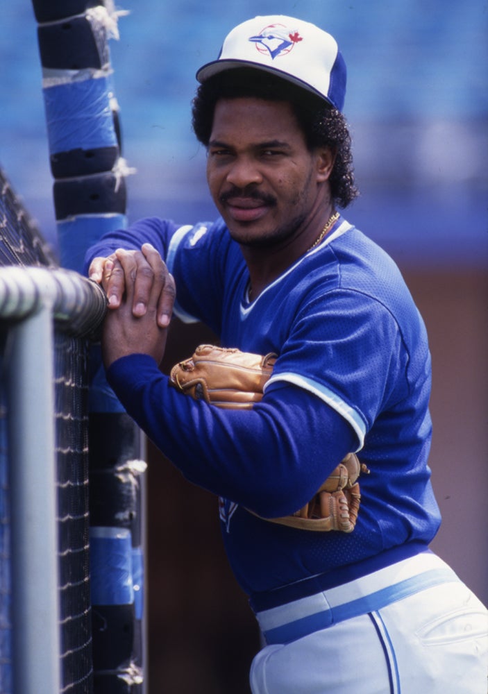 George Bell in Toronto uniform outside batting cage