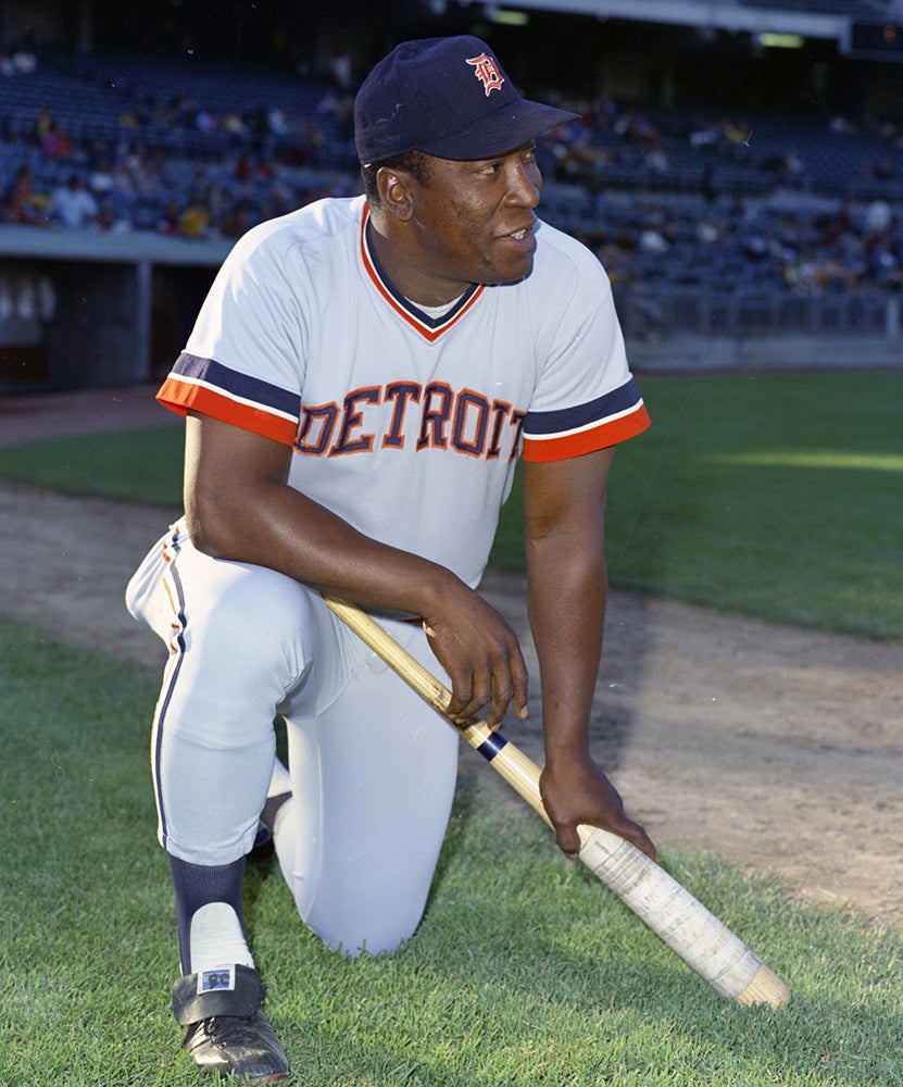 Gates Brown on one knee wearing Tigers uniform