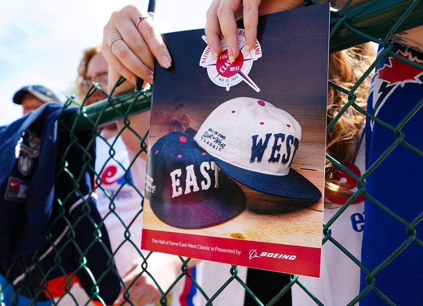 Fan holds Hall of Fame East-West Classic program