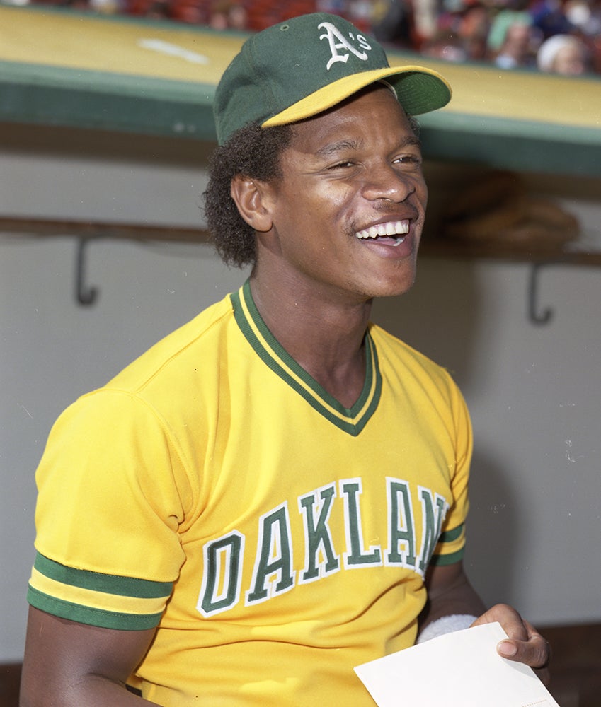 Rickey Henderson in gold Oakland uniform