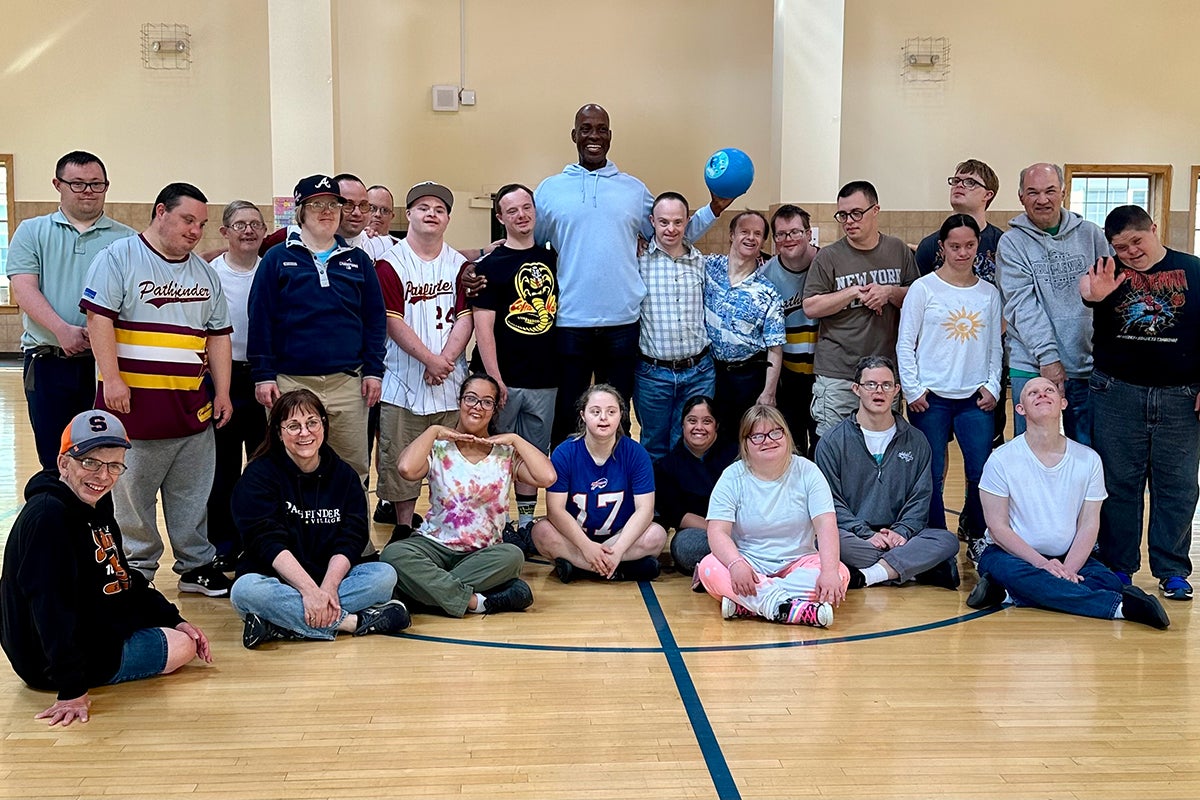 Fred McGriff with residents of Pathfinder Village in gymnasium