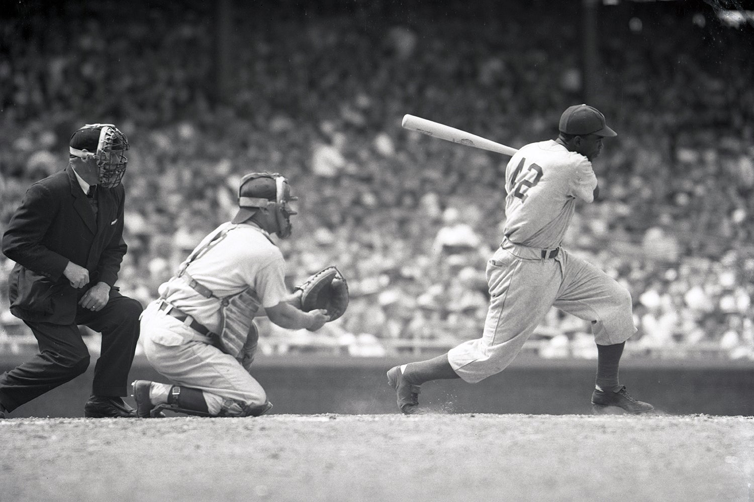 Jackie Robinson batting.