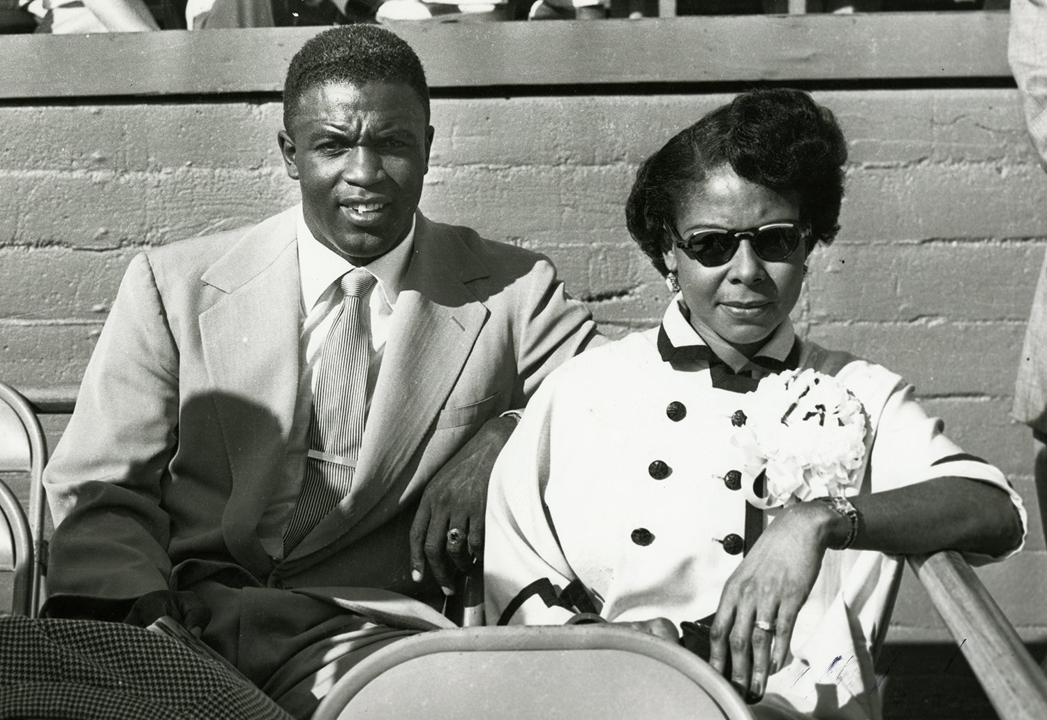 Jackie Robinson seated with Rachel Robinson.