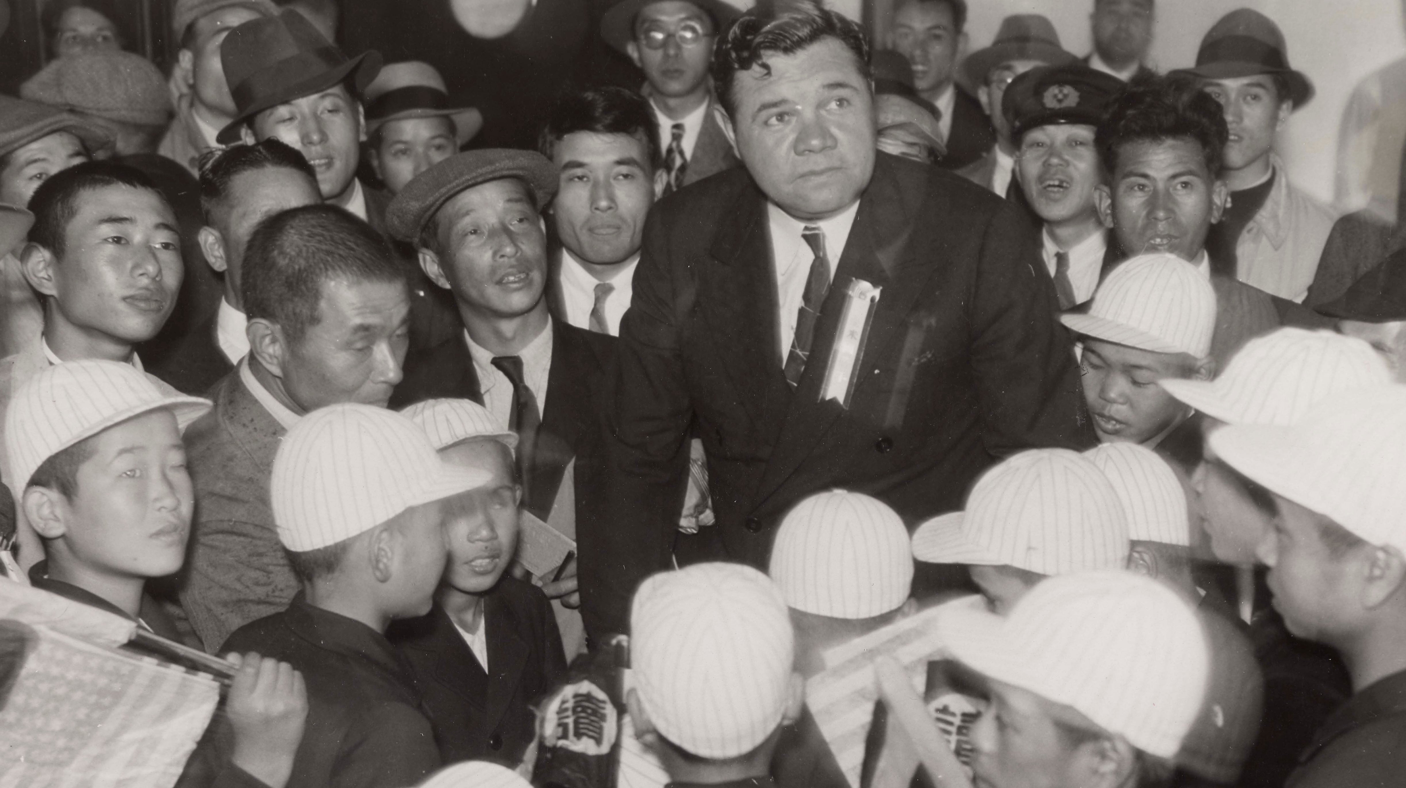 Babe Ruth with fans.