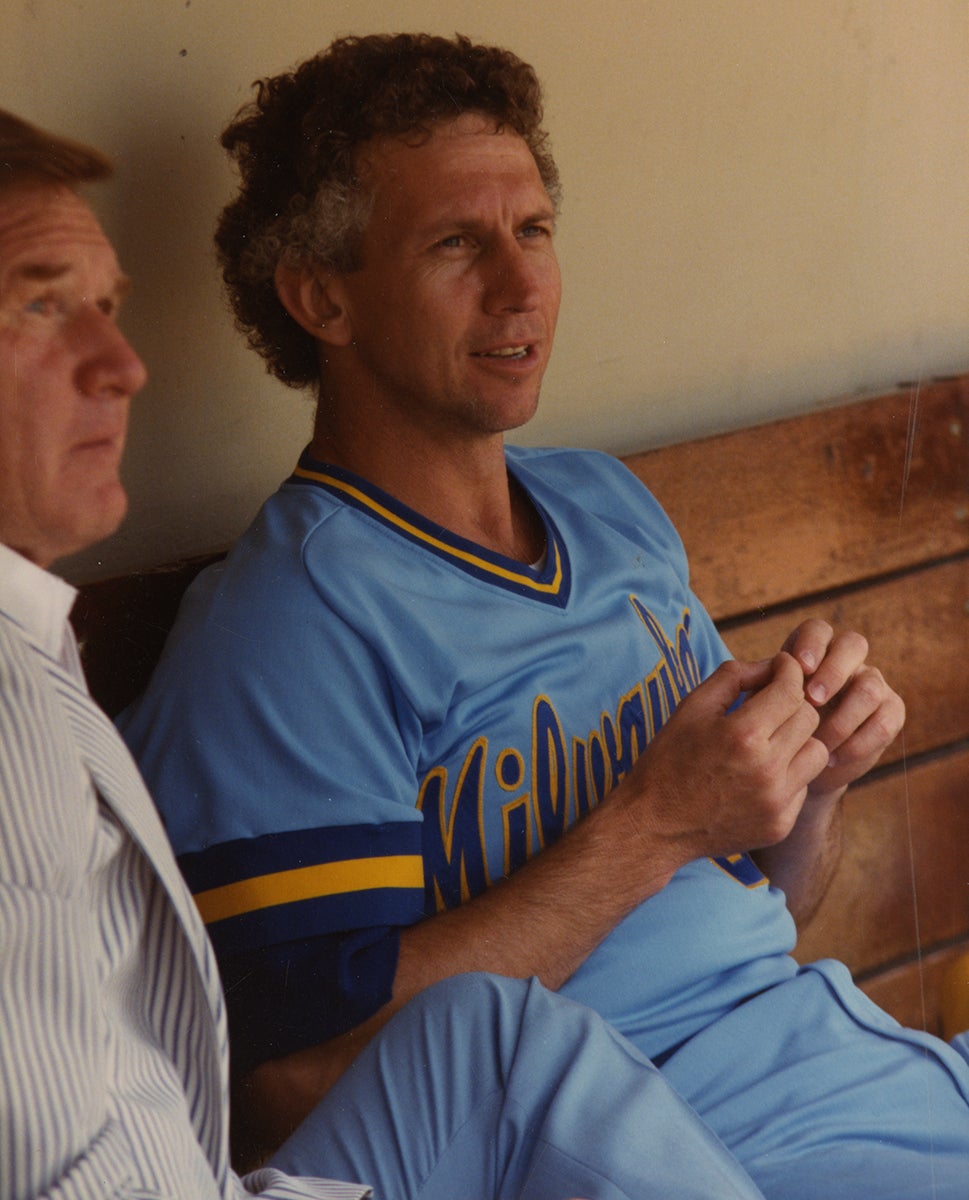 Don Sutton in dugout wearing Milwaukee jersey