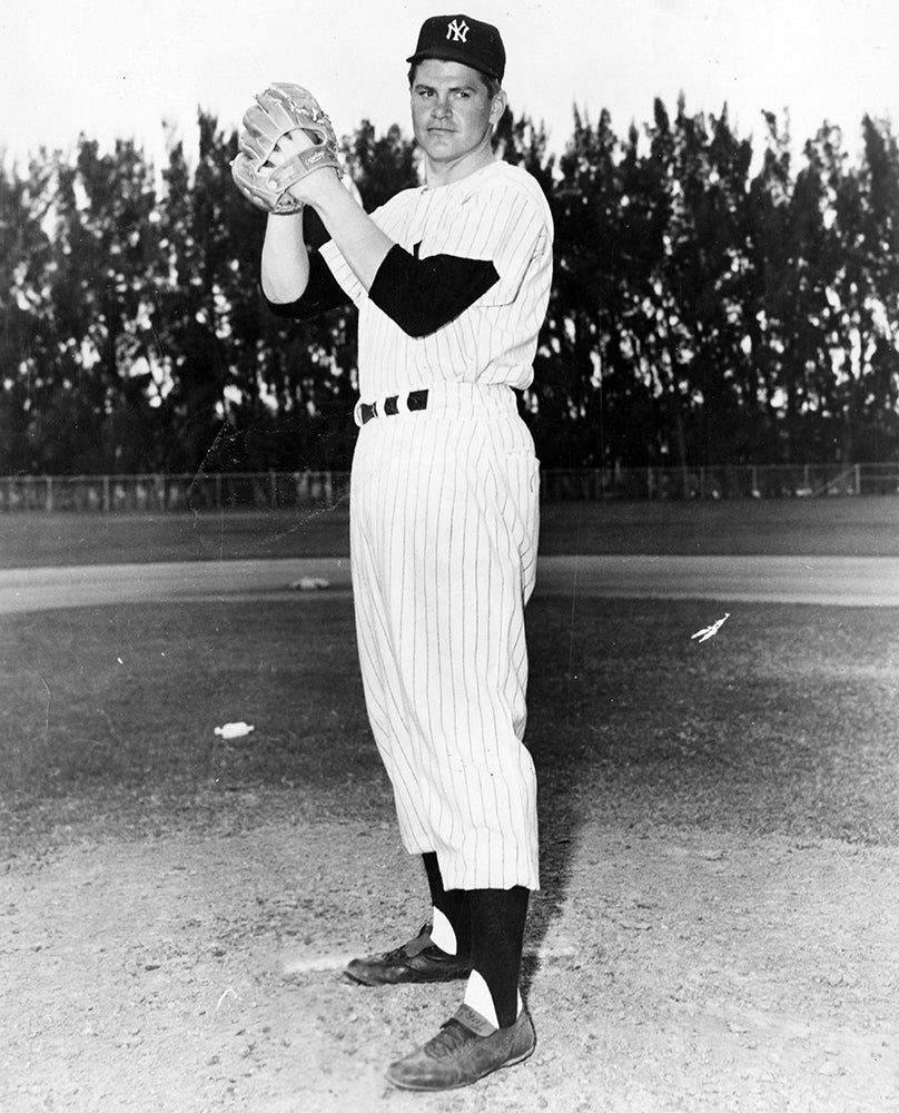 Bob Turley stands on mound in Yankees uniform