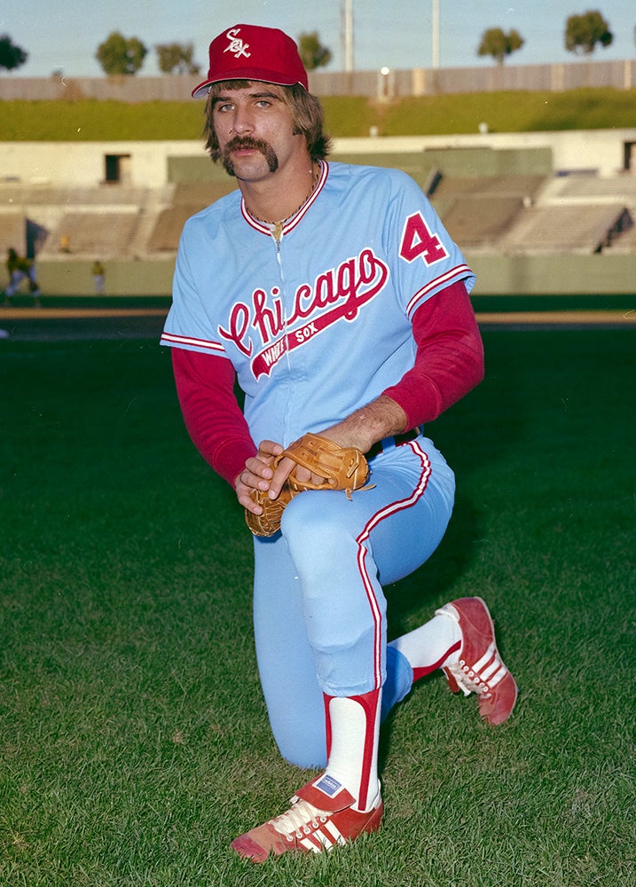Portrait of Pete Vuckovich in White Sox jersey on one knee