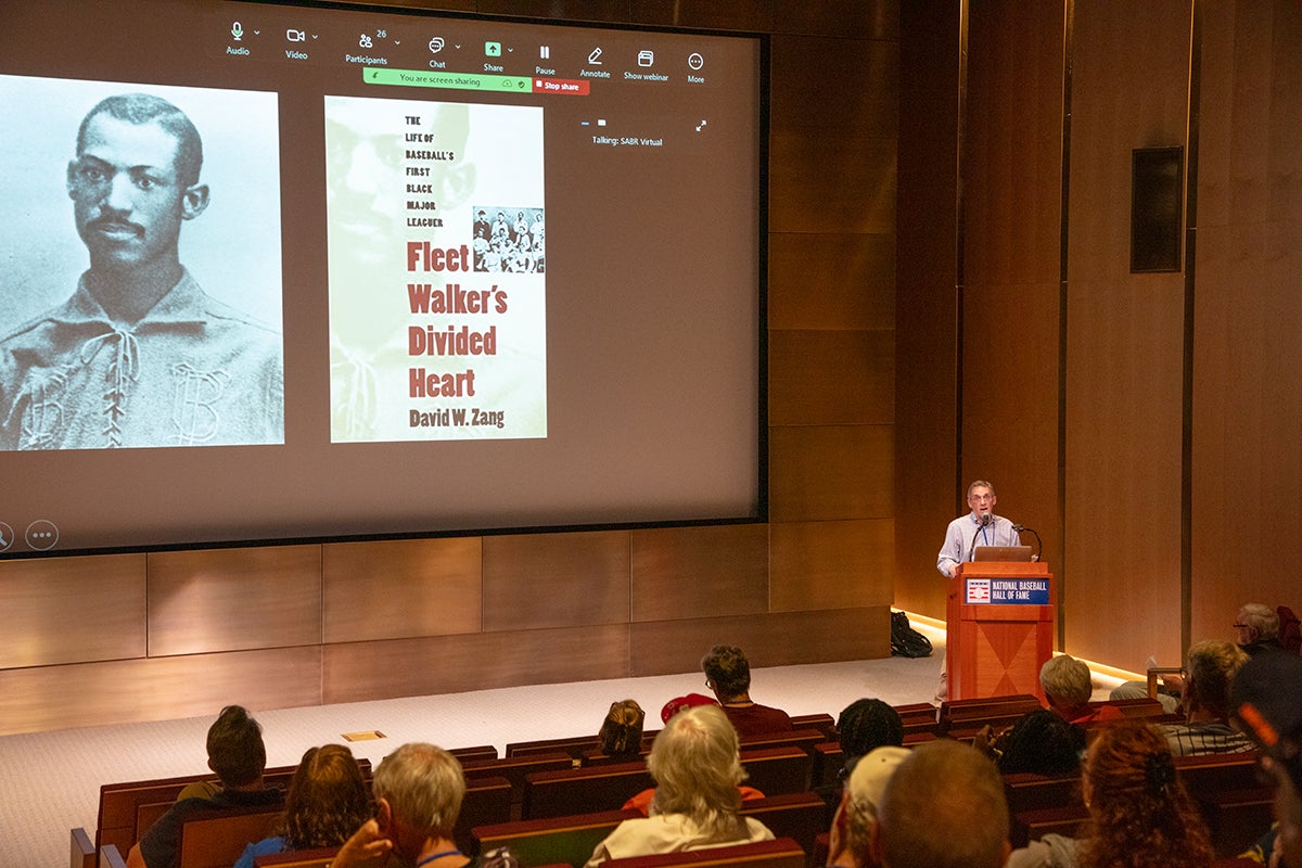 Visitors watch a presentation at the Malloy Conference